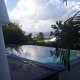 Piscine à débordement avec vue sur merLocation de villa Marie Galante - La Maison Casa Blue - Guadeloupe